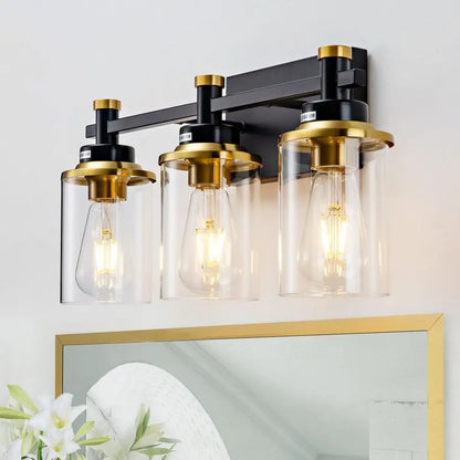 Black and Brushed Gold Vanity Light Fixture Over Mirror Style